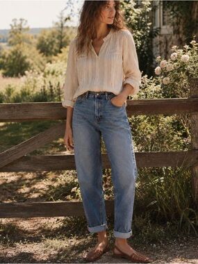 THE GREAT. The Slouch Taper Jean in Dark Wash